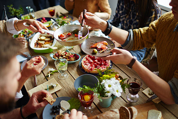 Shared family meal with several dishes on a table