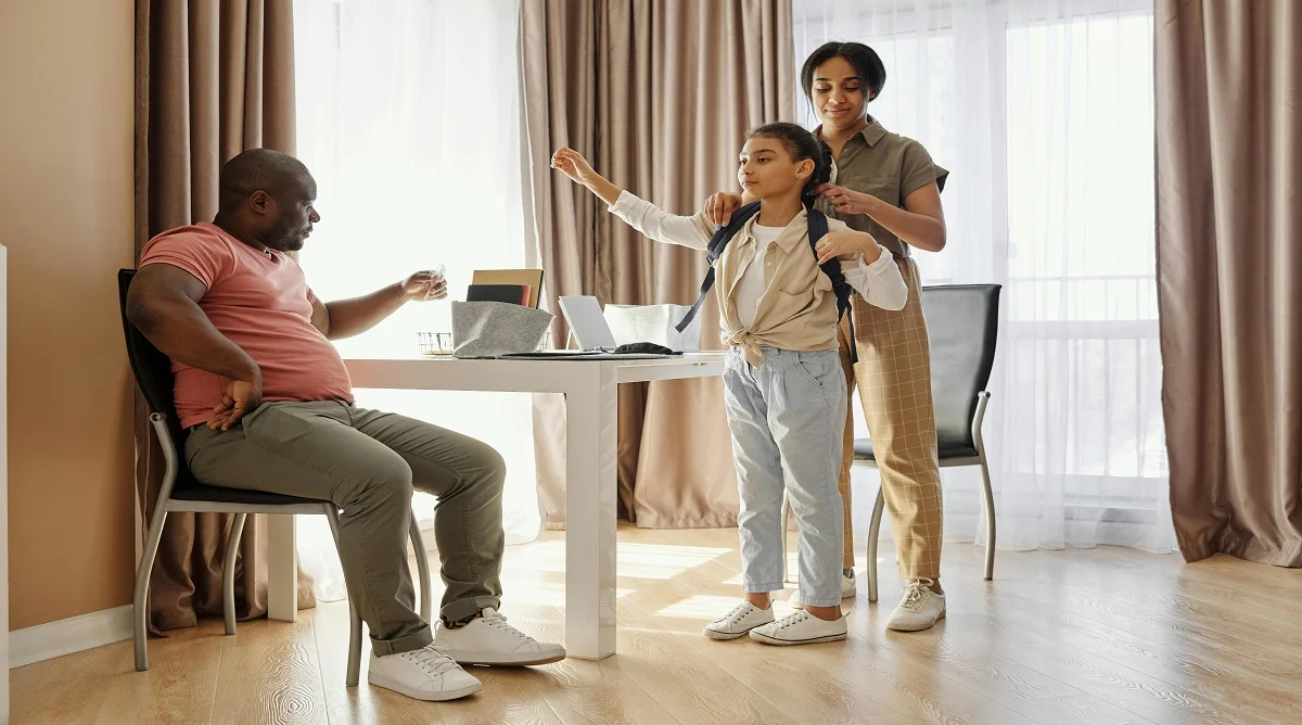 Parent and child following a calm morning routine at home before school