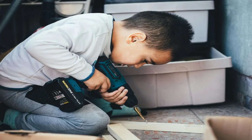 Child doing a calm short home learning task with focused attention