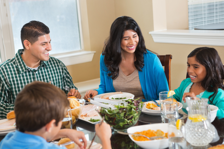Family meal with shared food and conversation