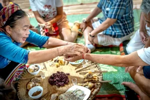 Family sharing a quiet repeated ritual together at home