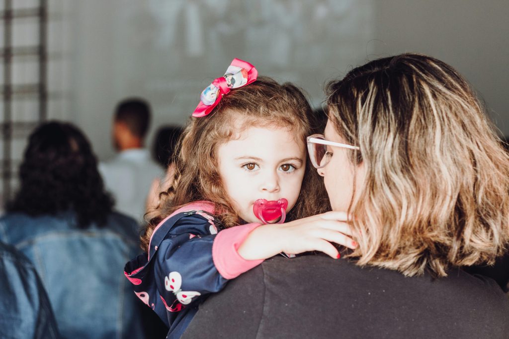 Parent talking to a child during a home routine