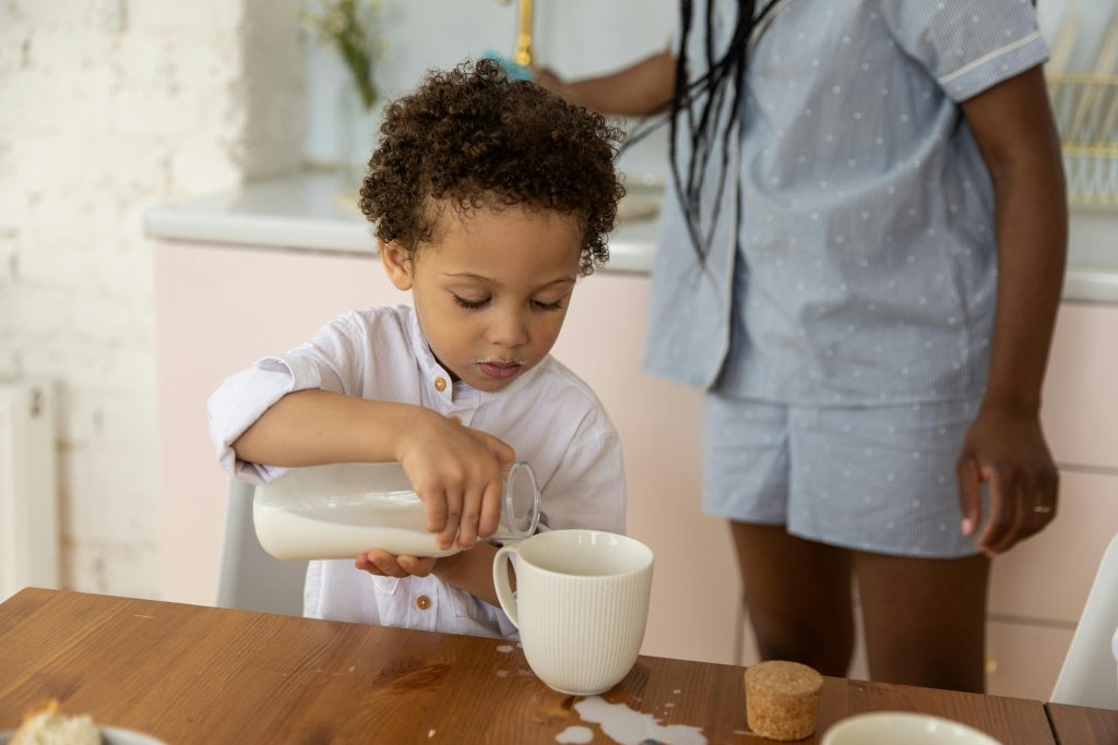 Child following a visible home routine with organized daily items