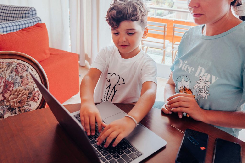 Parent guiding child from device use into another home activity