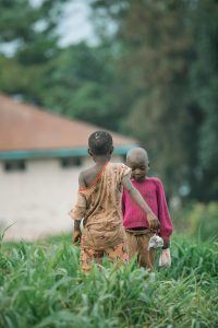 Children enjoying active outdoor play in a field