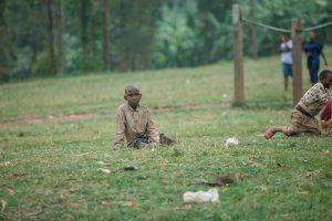 Children running and playing outdoors on a sunny day