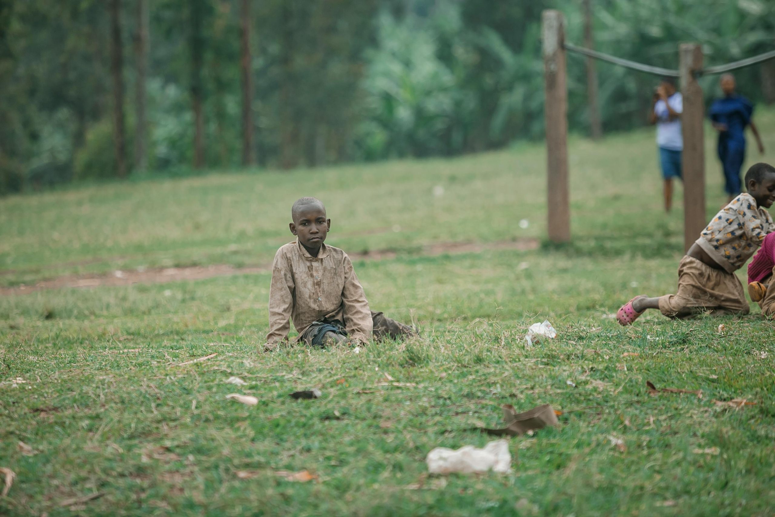 Children running and playing outdoors on a sunny day