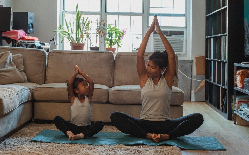 Parent and child practicing a simple daily sequence at home