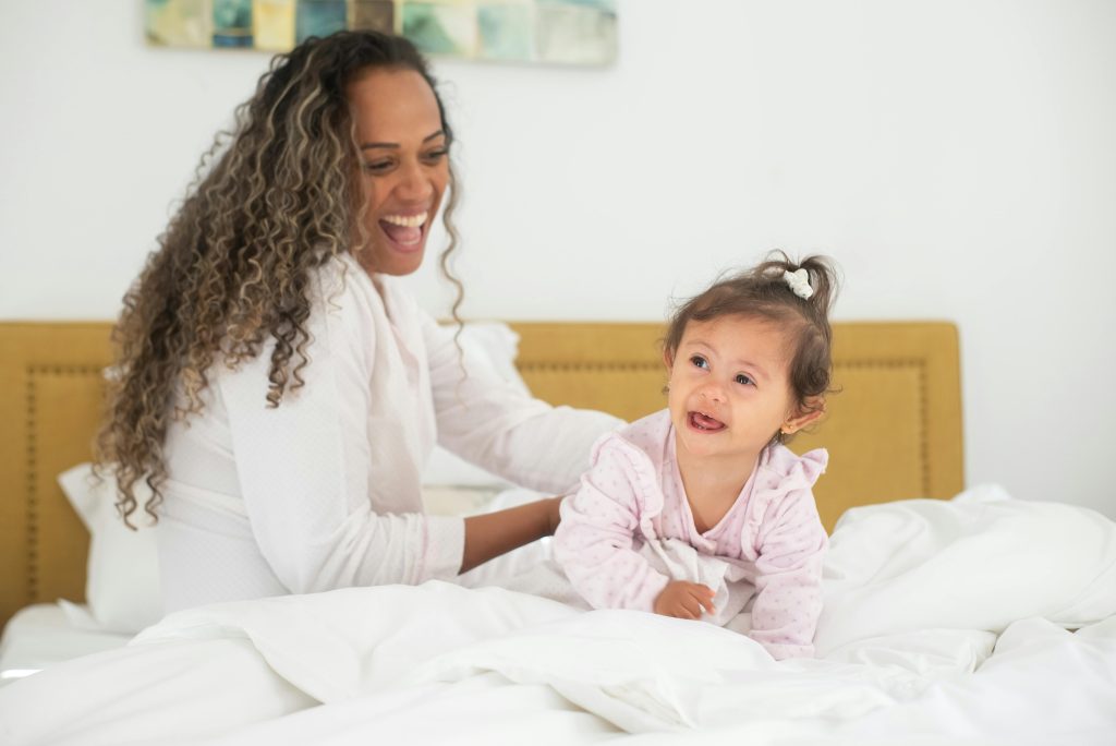 Parent calmly helping child get ready in the morning