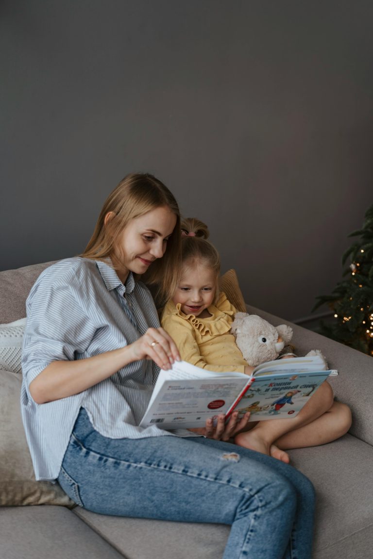 Parent reading with a young child at home