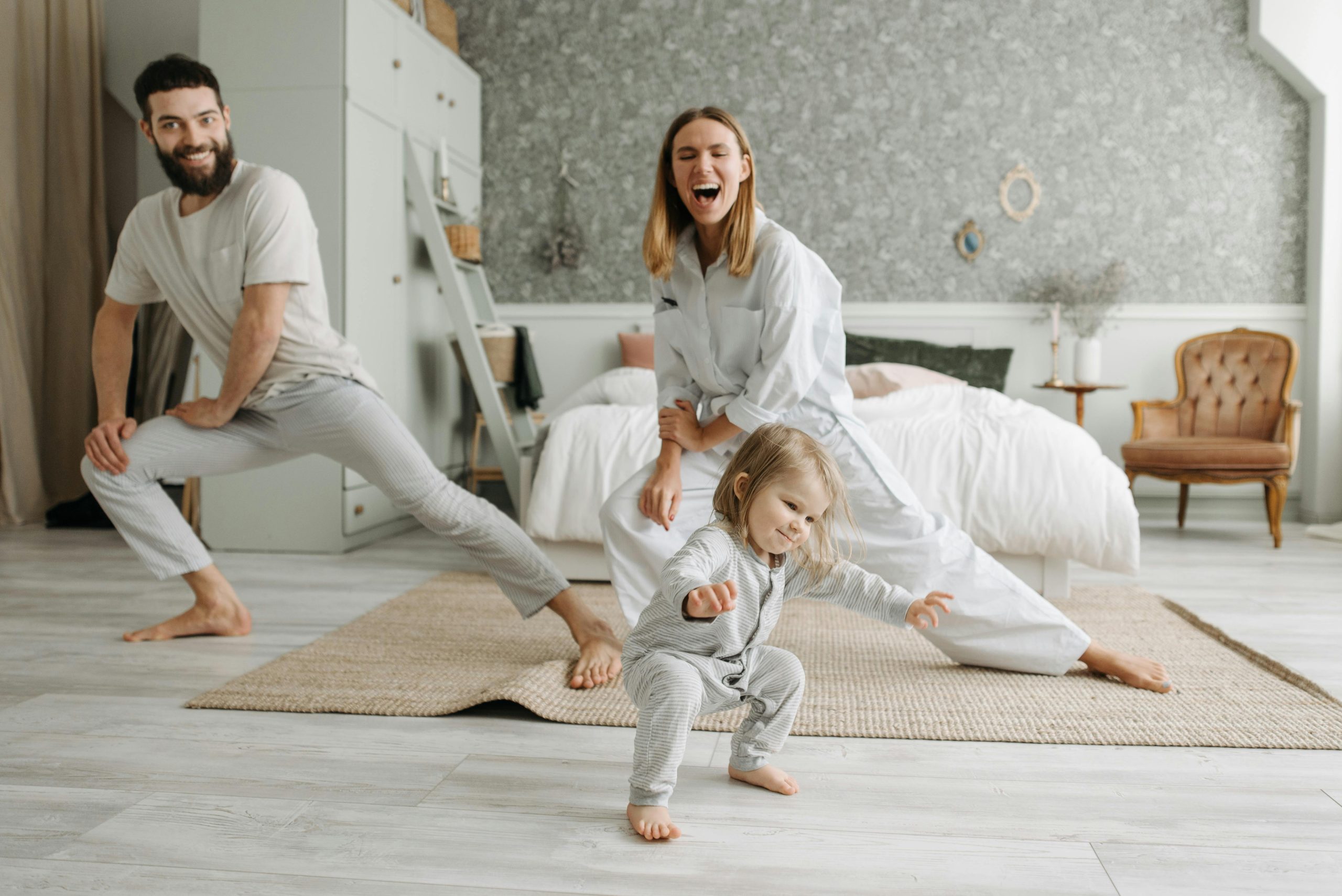 Parent helping children during a morning routine at home