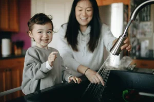 Parent and child following a consistent daily routine together at home