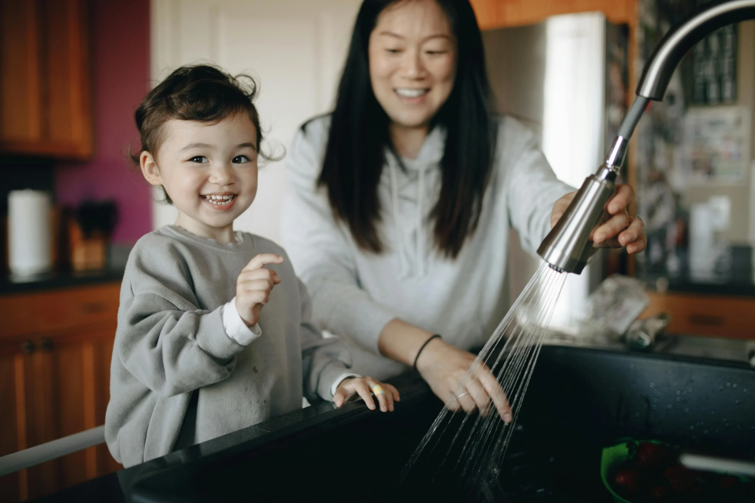 Parent and child following a consistent daily routine together at home