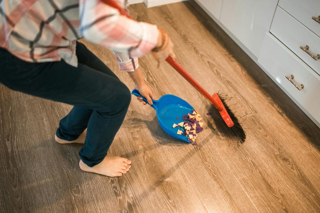 Child participating in a household chore