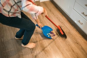 Child participating in a household chore
