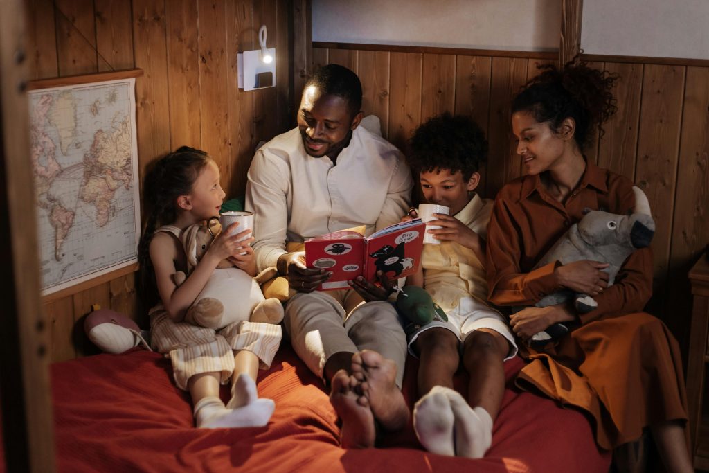 Parent reading with child during a bedtime routine