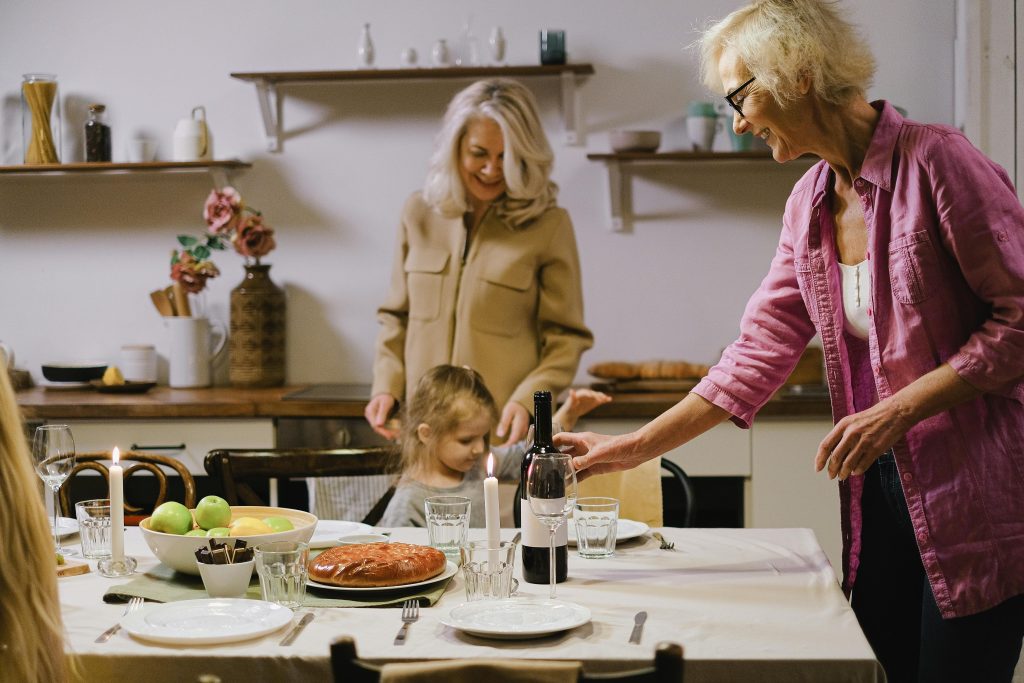 Family sharing a meal together at home