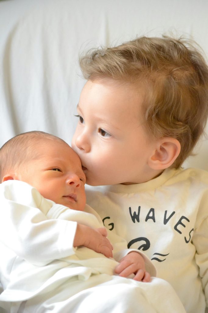 Siblings spending time together at home