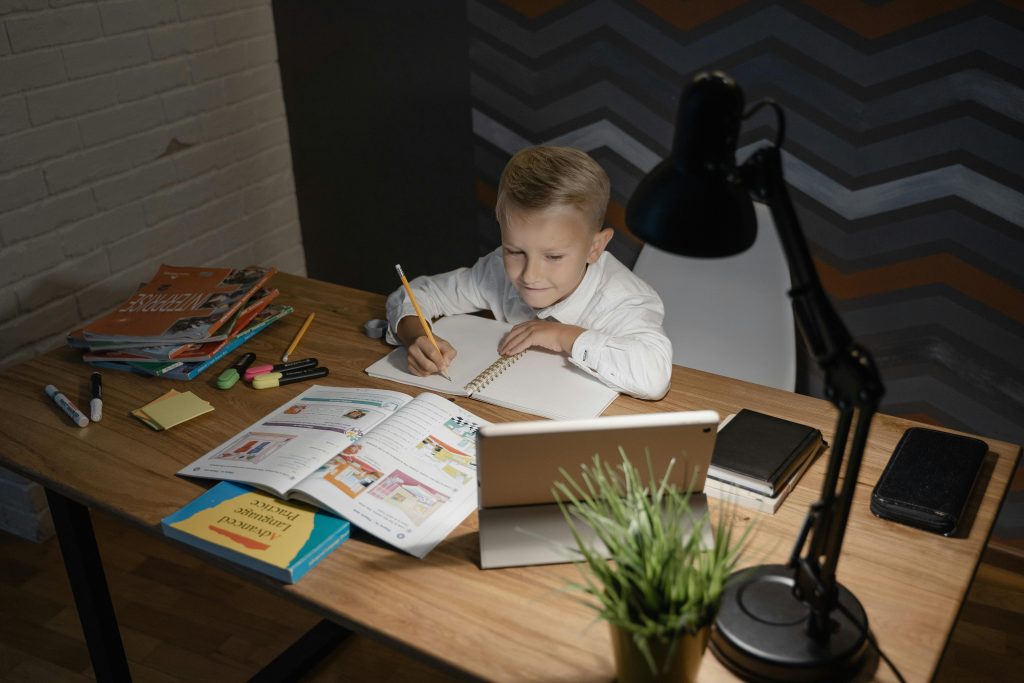 Child practicing reading and writing in a short home study session