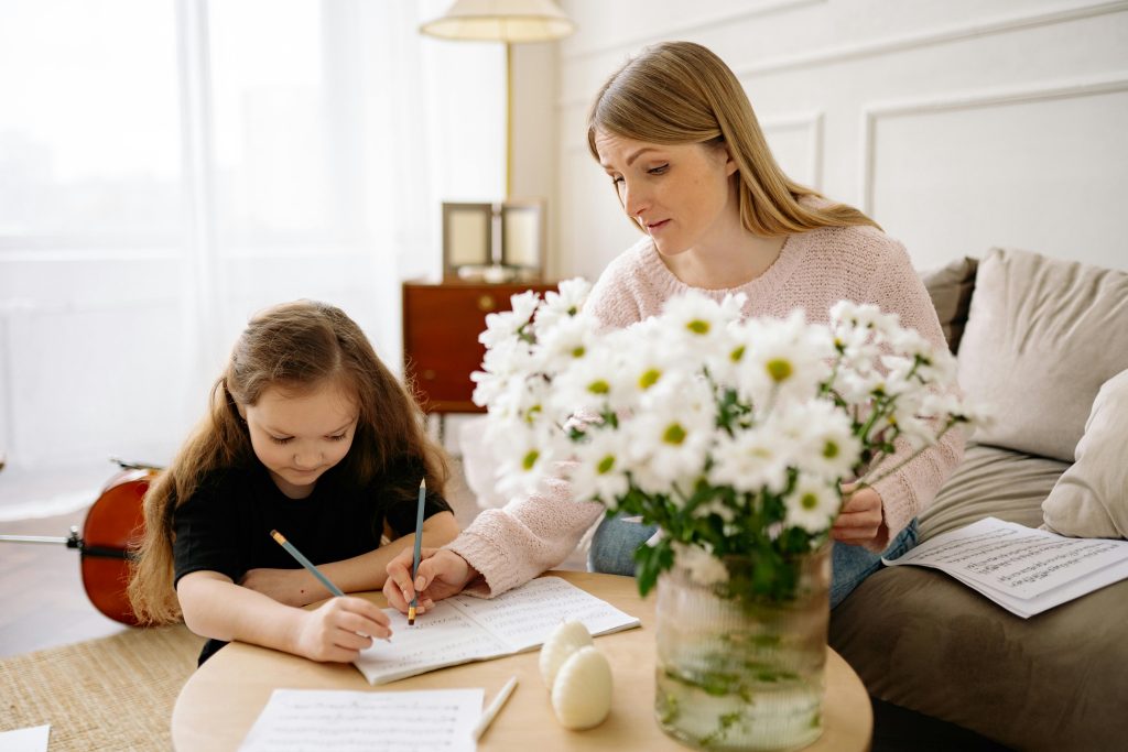 Child practicing the same task repeatedly with adult support