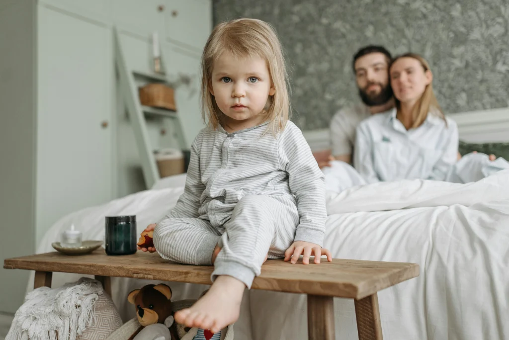 Child responding to a clear brief family rule during a home routine