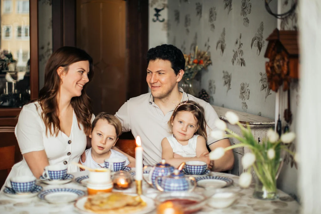 Family enjoying a familiar weekly ritual together at home