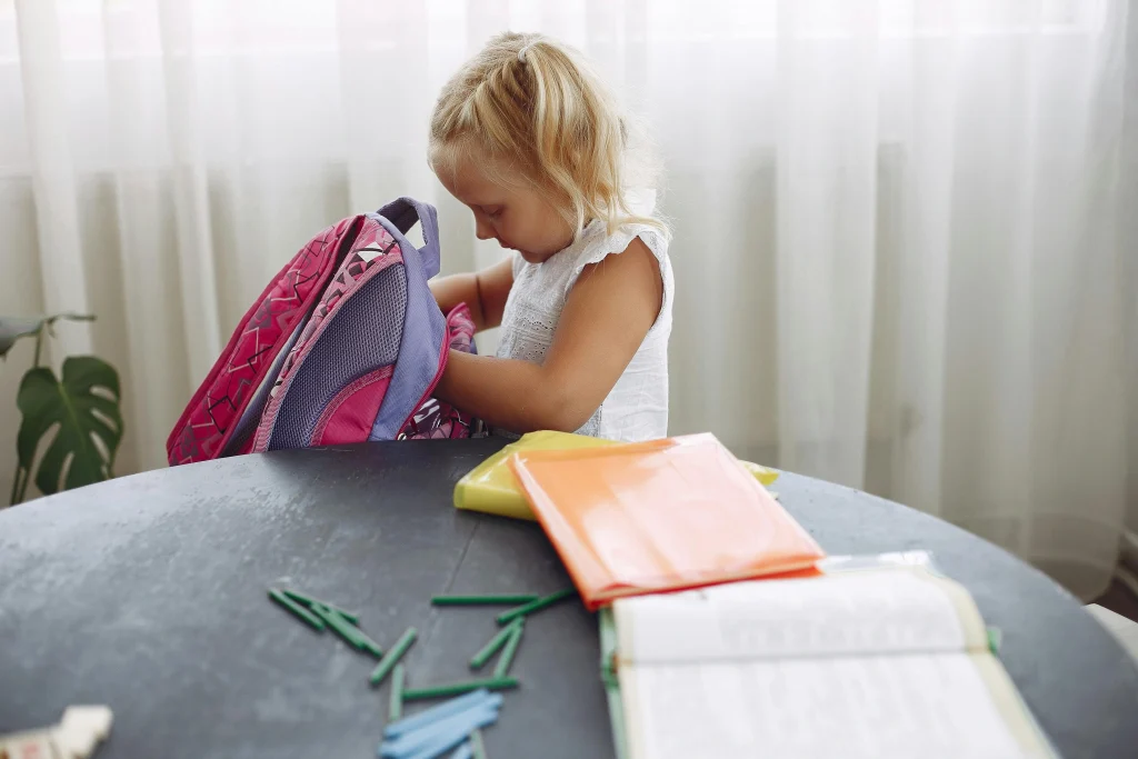 Organized daily routine items prepared in advance for a child at home