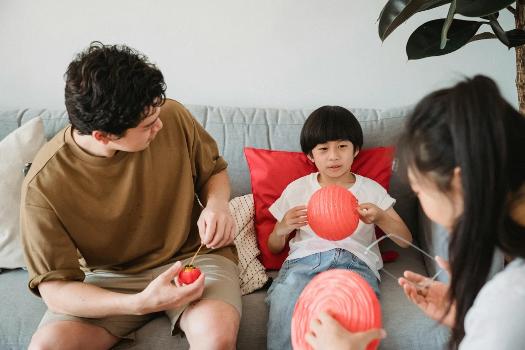 Parent and child sharing a familiar weekly ritual together at home