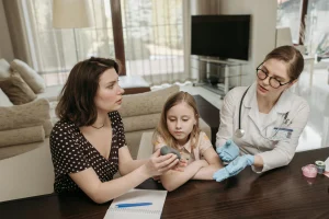 Parent calmly explaining a family rule to a child at home