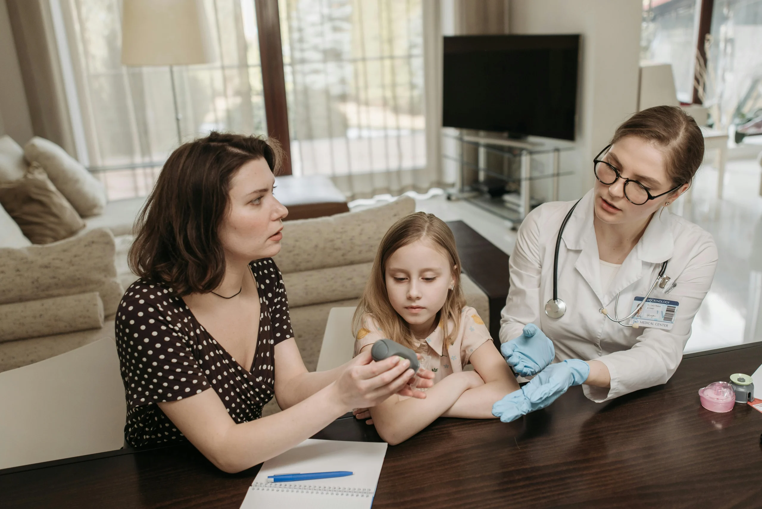 Parent calmly explaining a family rule to a child at home