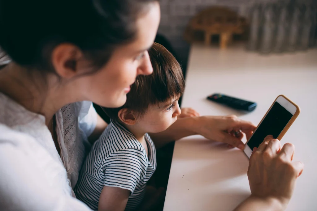Parent using calm consistent rule language with a child at home