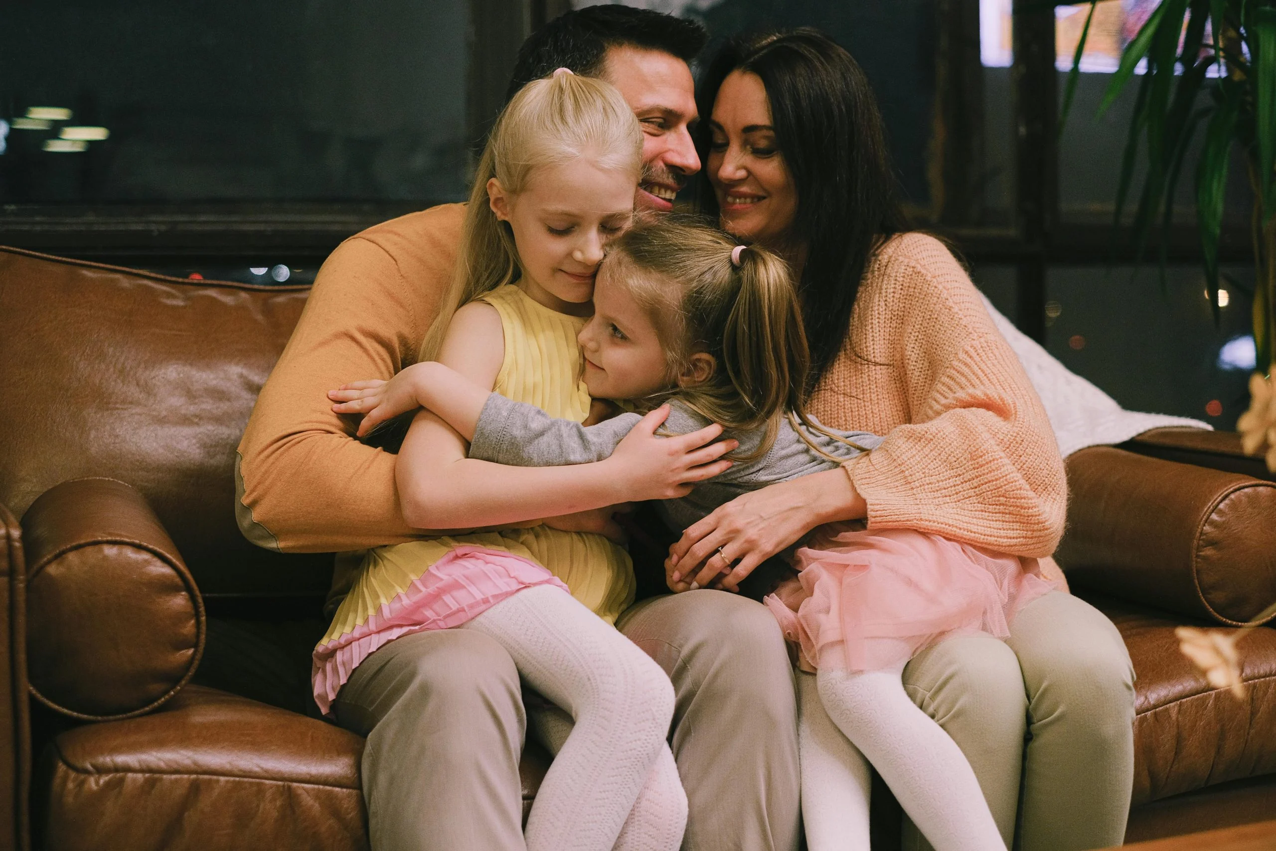 family relaxing at home together