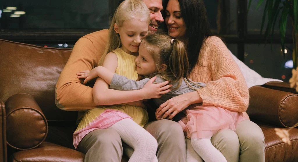 Family sitting together during a calm repeated evening tradition at home