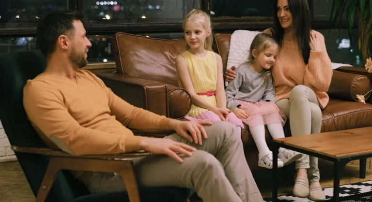 family members talking together at home