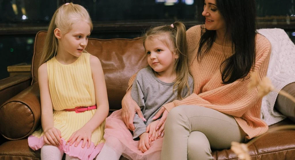 child in familiar spot at family gathering