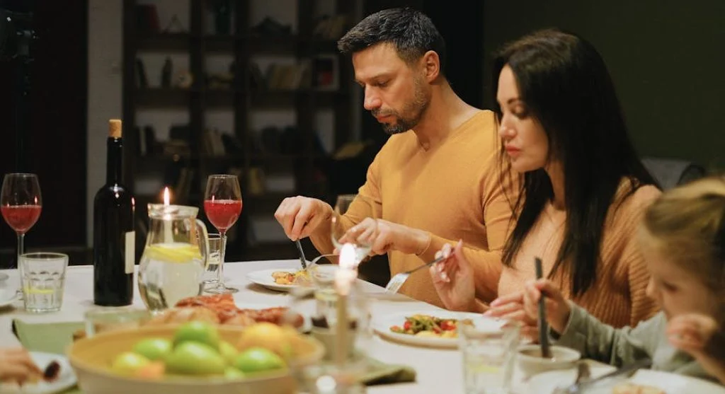 family having dinner together