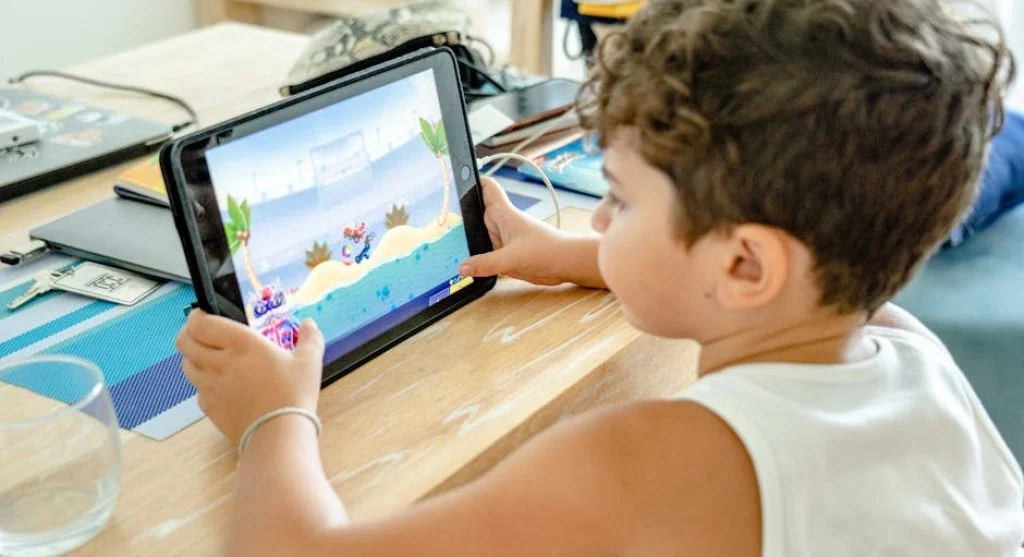 happy child playing video game