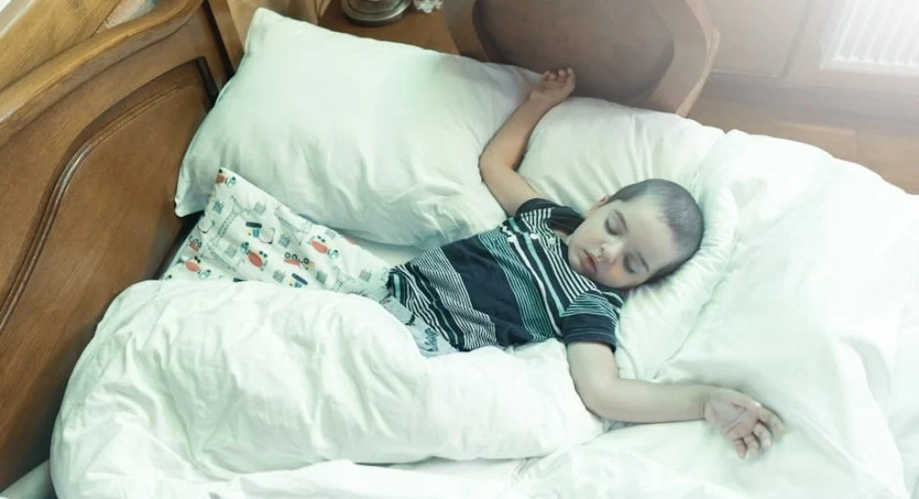 kid sleeping peacefully at home