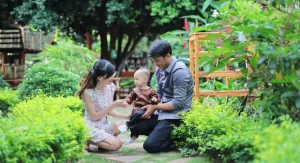 Parent calmly correcting a child while maintaining a warm connection at home