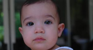 calm child smiling in natural light