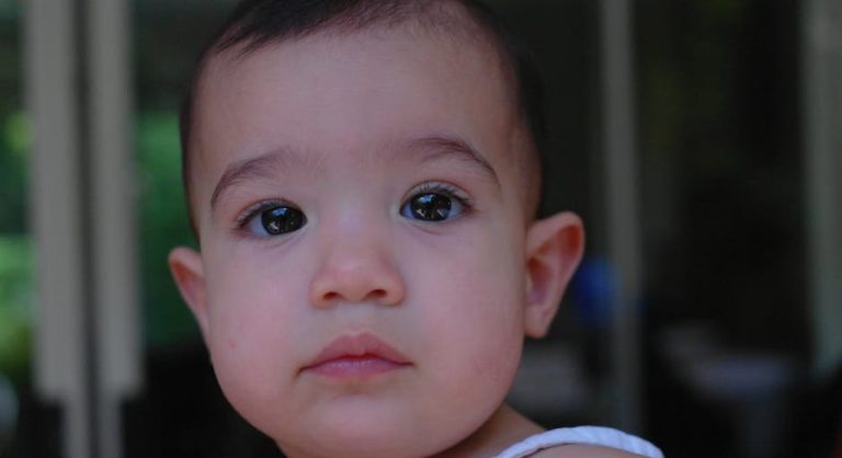 calm child smiling in natural light