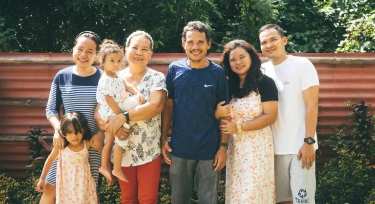 Family taking the same end-of-tradition photo together