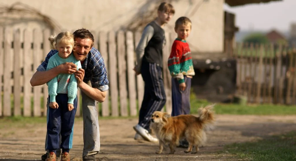 Child happily repeating a familiar job during a family tradition