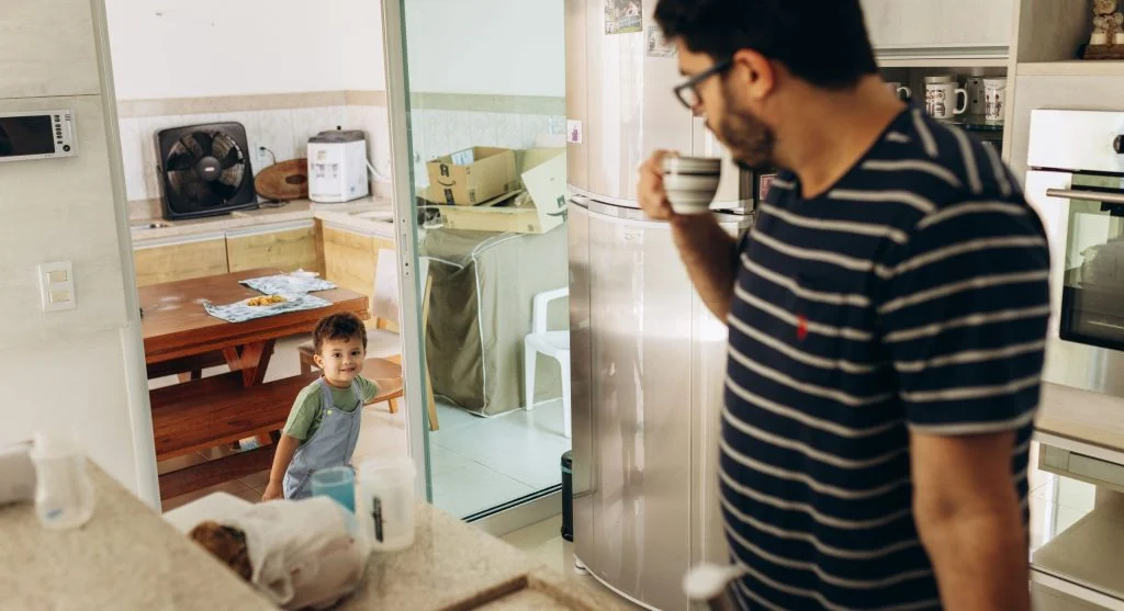 Child listening while a parent explains the next few minutes of a routine