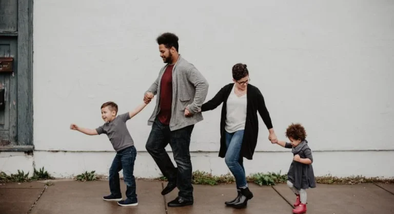 happy family walking together outdoors