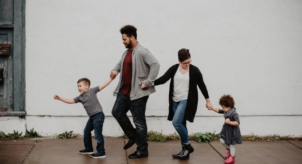 happy family walking together outdoors
