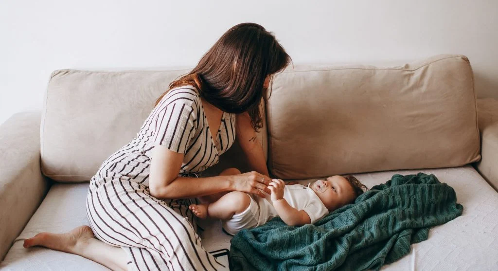 Parent offering comfort during a temporary return to an old soothing habit