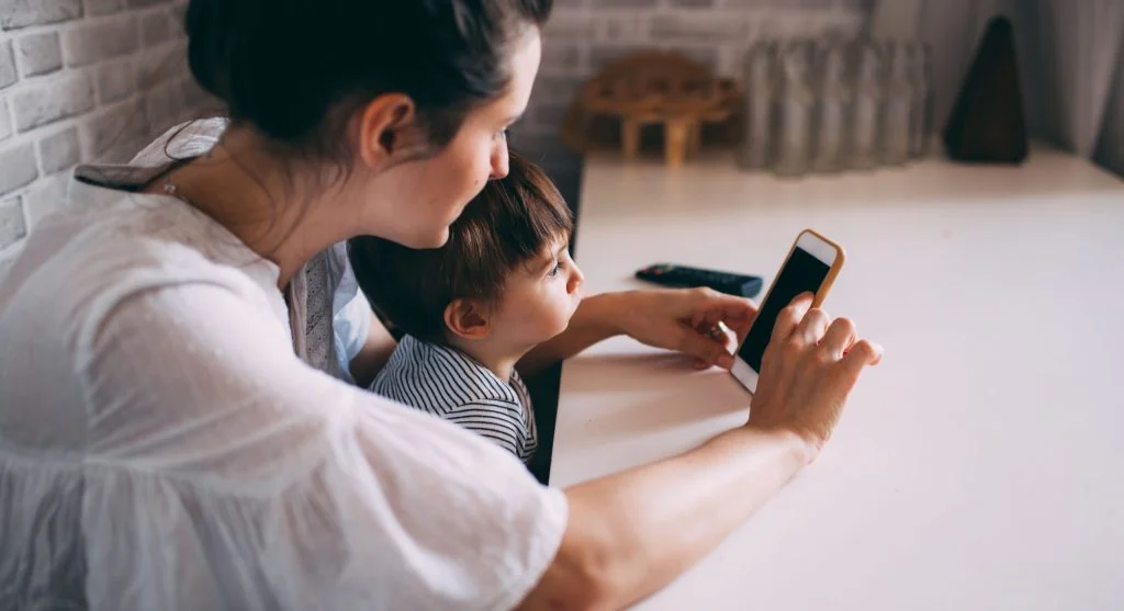 Parent calmly acknowledging a child’s wish before setting a limit at home