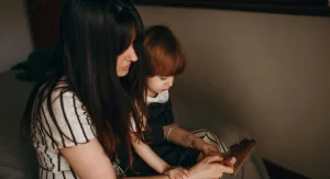 parent guiding child in calm behavior