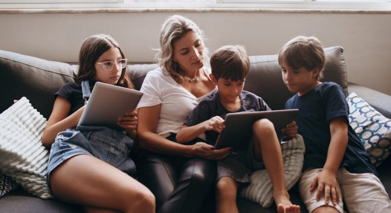 family using devices together